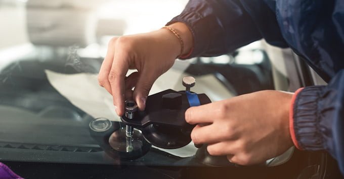 Windshield being replaced